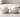 A clean, minimal kitchen countertop scene showing a side-by-side comparison of two scoops of vanilla ice cream in identical small ceramic bowls